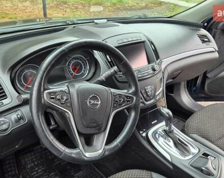 Синий Опель Инсигния, объемом двигателя 1.96 л и пробегом 226 тыс. км за 9300 $, фото 2 на Automoto.ua