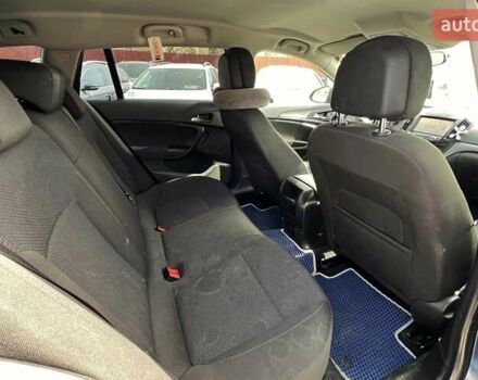 Синій Опель Інсігнія, об'ємом двигуна 2 л та пробігом 250 тис. км за 10300 $, фото 17 на Automoto.ua