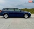 Синий Опель Инсигния, объемом двигателя 2 л и пробегом 245 тыс. км за 10900 $, фото 3 на Automoto.ua