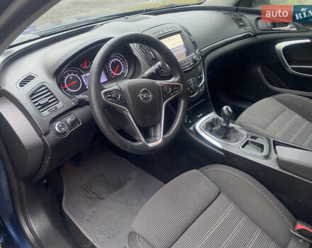 Синий Опель Инсигния, объемом двигателя 1.6 л и пробегом 210 тыс. км за 11500 $, фото 4 на Automoto.ua