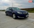 Синий Опель Инсигния, объемом двигателя 2 л и пробегом 245 тыс. км за 10900 $, фото 2 на Automoto.ua