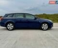 Синий Опель Инсигния, объемом двигателя 2 л и пробегом 245 тыс. км за 10900 $, фото 3 на Automoto.ua