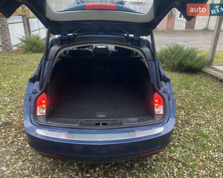 Синій Опель Інсігнія, об'ємом двигуна 1.6 л та пробігом 210 тис. км за 10500 $, фото 6 на Automoto.ua