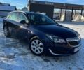 Синий Опель Инсигния, объемом двигателя 2 л и пробегом 245 тыс. км за 9500 $, фото 1 на Automoto.ua