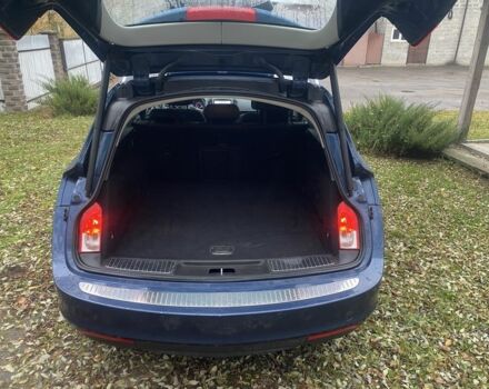 Синий Опель Инсигния, объемом двигателя 1.6 л и пробегом 210 тыс. км за 11500 $, фото 6 на Automoto.ua