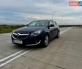 Синий Опель Инсигния, объемом двигателя 2 л и пробегом 245 тыс. км за 10900 $, фото 1 на Automoto.ua