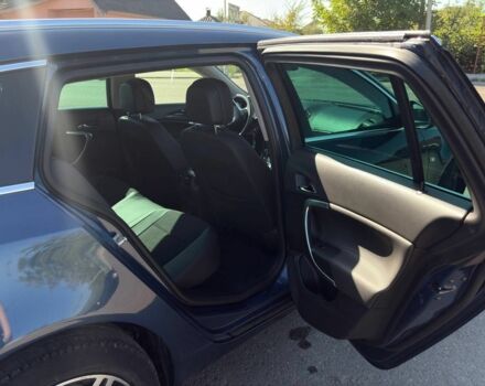 Синий Опель Инсигния, объемом двигателя 1.6 л и пробегом 197 тыс. км за 12000 $, фото 5 на Automoto.ua