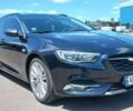 Синий Опель Инсигния, объемом двигателя 1.6 л и пробегом 190 тыс. км за 12000 $, фото 2 на Automoto.ua