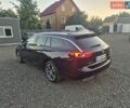 Синий Опель Инсигния, объемом двигателя 2 л и пробегом 235 тыс. км за 14600 $, фото 6 на Automoto.ua