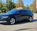 Синий Опель Инсигния, объемом двигателя 2 л и пробегом 135 тыс. км за 16000 $, фото 1 на Automoto.ua