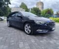 Синий Опель Инсигния, объемом двигателя 2 л и пробегом 297 тыс. км за 12099 $, фото 1 на Automoto.ua