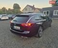 Синий Опель Инсигния, объемом двигателя 2 л и пробегом 235 тыс. км за 14600 $, фото 4 на Automoto.ua