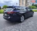Синий Опель Инсигния, объемом двигателя 2 л и пробегом 297 тыс. км за 12499 $, фото 10 на Automoto.ua