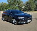 Синий Опель Инсигния, объемом двигателя 2 л и пробегом 135 тыс. км за 16000 $, фото 1 на Automoto.ua