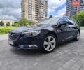 Синий Опель Инсигния, объемом двигателя 2 л и пробегом 297 тыс. км за 12499 $, фото 1 на Automoto.ua