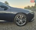 Синий Опель Инсигния, объемом двигателя 2 л и пробегом 235 тыс. км за 14600 $, фото 1 на Automoto.ua