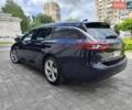 Синий Опель Инсигния, объемом двигателя 2 л и пробегом 297 тыс. км за 12499 $, фото 4 на Automoto.ua