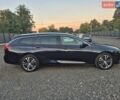Синий Опель Инсигния, объемом двигателя 2 л и пробегом 235 тыс. км за 14600 $, фото 2 на Automoto.ua