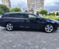 Синій Опель Інсігнія, об'ємом двигуна 2 л та пробігом 297 тис. км за 11925 $, фото 3 на Automoto.ua