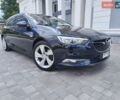 Синий Опель Инсигния, объемом двигателя 2 л и пробегом 297 тыс. км за 12399 $, фото 1 на Automoto.ua