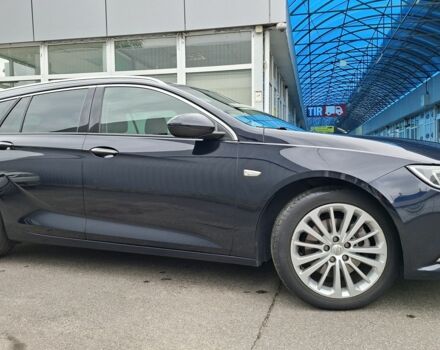 Синій Опель Інсігнія, об'ємом двигуна 1.6 л та пробігом 165 тис. км за 14700 $, фото 4 на Automoto.ua