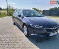 Синий Опель Инсигния, объемом двигателя 2 л и пробегом 239 тыс. км за 13900 $, фото 1 на Automoto.ua