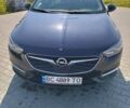 Синий Опель Инсигния, объемом двигателя 2 л и пробегом 239 тыс. км за 13900 $, фото 2 на Automoto.ua