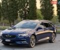 Синий Опель Инсигния, объемом двигателя 2 л и пробегом 198 тыс. км за 16700 $, фото 1 на Automoto.ua