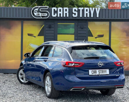 Синий Опель Инсигния, объемом двигателя 2 л и пробегом 249 тыс. км за 14999 $, фото 2 на Automoto.ua
