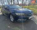 Синій Опель Інсігнія, об'ємом двигуна 1.6 л та пробігом 156 тис. км за 15500 $, фото 4 на Automoto.ua