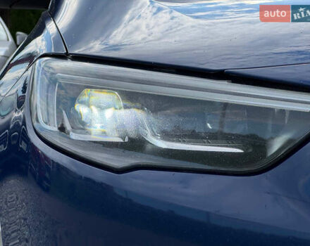 Синий Опель Инсигния, объемом двигателя 2 л и пробегом 249 тыс. км за 14999 $, фото 9 на Automoto.ua