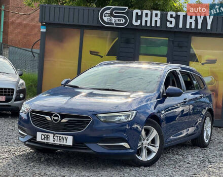 Синий Опель Инсигния, объемом двигателя 2 л и пробегом 249 тыс. км за 14999 $, фото 1 на Automoto.ua