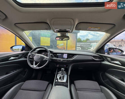 Синий Опель Инсигния, объемом двигателя 2 л и пробегом 249 тыс. км за 14999 $, фото 4 на Automoto.ua