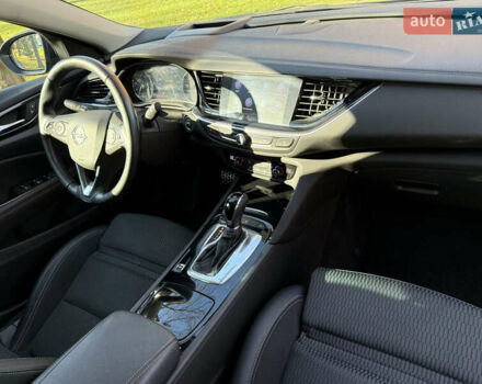 Синий Опель Инсигния, объемом двигателя 1.6 л и пробегом 156 тыс. км за 15500 $, фото 70 на Automoto.ua