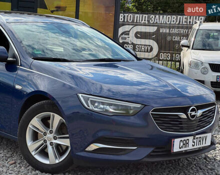 Синий Опель Инсигния, объемом двигателя 2 л и пробегом 249 тыс. км за 14999 $, фото 5 на Automoto.ua