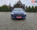 Синий Опель Инсигния, объемом двигателя 2 л и пробегом 240 тыс. км за 14900 $, фото 3 на Automoto.ua