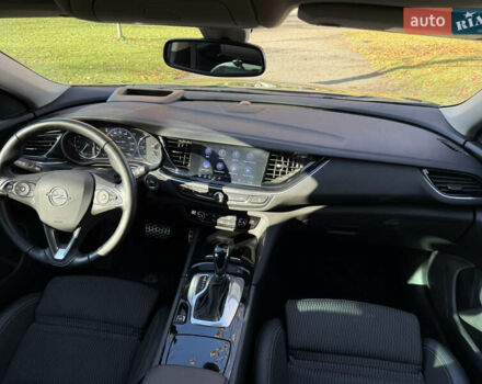 Синий Опель Инсигния, объемом двигателя 1.6 л и пробегом 156 тыс. км за 15500 $, фото 78 на Automoto.ua