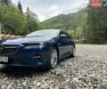 Синий Опель Инсигния, объемом двигателя 2 л и пробегом 167 тыс. км за 17500 $, фото 4 на Automoto.ua