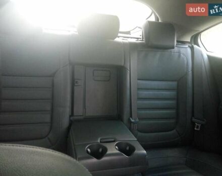 Синій Опель Інсігнія, об'ємом двигуна 1.96 л та пробігом 245 тис. км за 9500 $, фото 3 на Automoto.ua