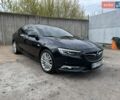 Синий Опель Инсигния, объемом двигателя 2 л и пробегом 234 тыс. км за 14999 $, фото 1 на Automoto.ua