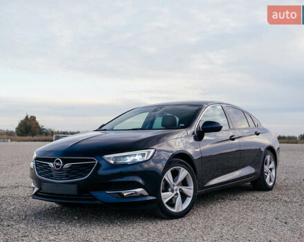 Синій Опель Інсігнія, об'ємом двигуна 2 л та пробігом 242 тис. км за 16500 $, фото 1 на Automoto.ua