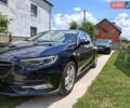 Синій Опель Інсігнія, об'ємом двигуна 2 л та пробігом 245 тис. км за 14800 $, фото 1 на Automoto.ua