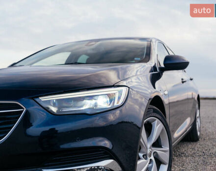 Синій Опель Інсігнія, об'ємом двигуна 2 л та пробігом 242 тис. км за 16500 $, фото 2 на Automoto.ua