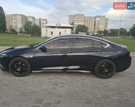 Синий Опель Инсигния, объемом двигателя 2 л и пробегом 135 тыс. км за 17999 $, фото 2 на Automoto.ua