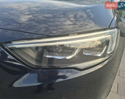 Синий Опель Инсигния, объемом двигателя 2 л и пробегом 135 тыс. км за 17999 $, фото 24 на Automoto.ua