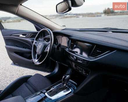 Синій Опель Інсігнія, об'ємом двигуна 2 л та пробігом 242 тис. км за 16500 $, фото 45 на Automoto.ua