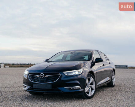 Синий Опель Инсигния, объемом двигателя 2 л и пробегом 242 тыс. км за 16500 $, фото 1 на Automoto.ua