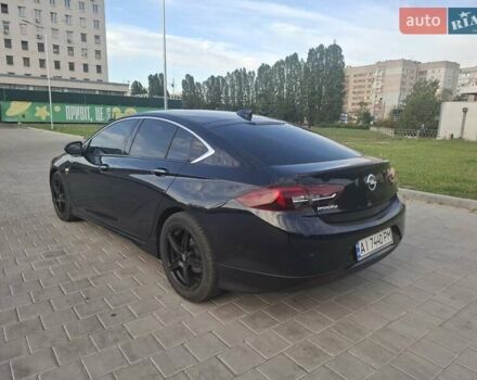 Синий Опель Инсигния, объемом двигателя 2 л и пробегом 135 тыс. км за 17999 $, фото 3 на Automoto.ua