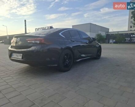 Синий Опель Инсигния, объемом двигателя 2 л и пробегом 135 тыс. км за 17999 $, фото 4 на Automoto.ua