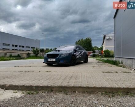 Синий Опель Инсигния, объемом двигателя 2 л и пробегом 320 тыс. км за 8500 $, фото 1 на Automoto.ua